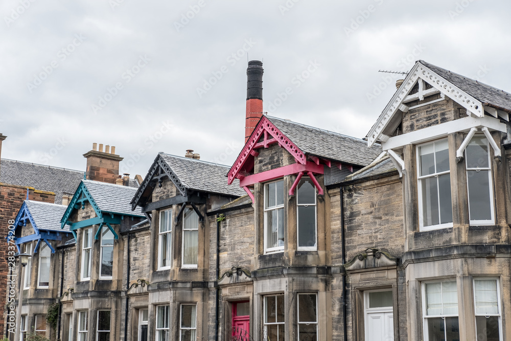 Old building with colorful gable in the suburb of Edinburgh, United Kingdom