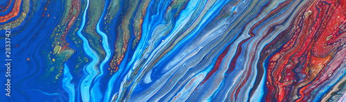 photography of abstract marbleized effect background. Blue  red and white creative colors. Beautiful paint. banner
