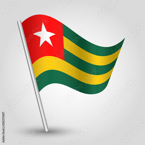 vector waving simple triangle togolese flag on slanted silver pole - symbol of togo with metal stick