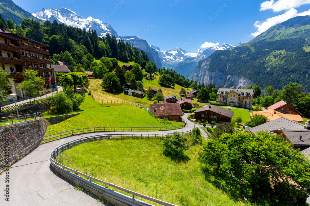 View of the Swiss Alps near the city of Lauterbrunnen. Switzerland. - obrazy, fototapety, plakaty 