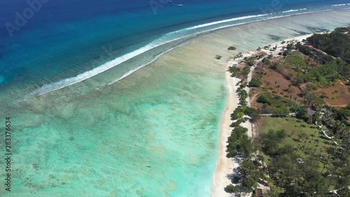 Flying over the turquoise ocean of Indonesia