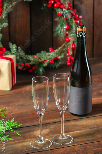 glasses and bottle of champagne (festive atmosphere) serving. top food background. copy space
