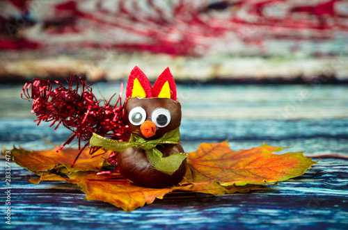 fox figures made from chestnut autumnal fruits