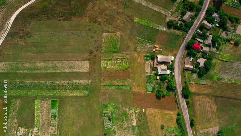 4K Drone. Aerial view of Desna, an urban-type settlement in Kozelets Raion, Chernihiv Oblast in northern Ukraine. Shot on a bright summer day with blue sky and few clouds. 4K Drone. Aerial view of Desna, an urban-type settlement in Kozelets Raion, Chernihiv Oblast in northern Ukraine. Shot on a bright summer day with blue sky and few clouds.