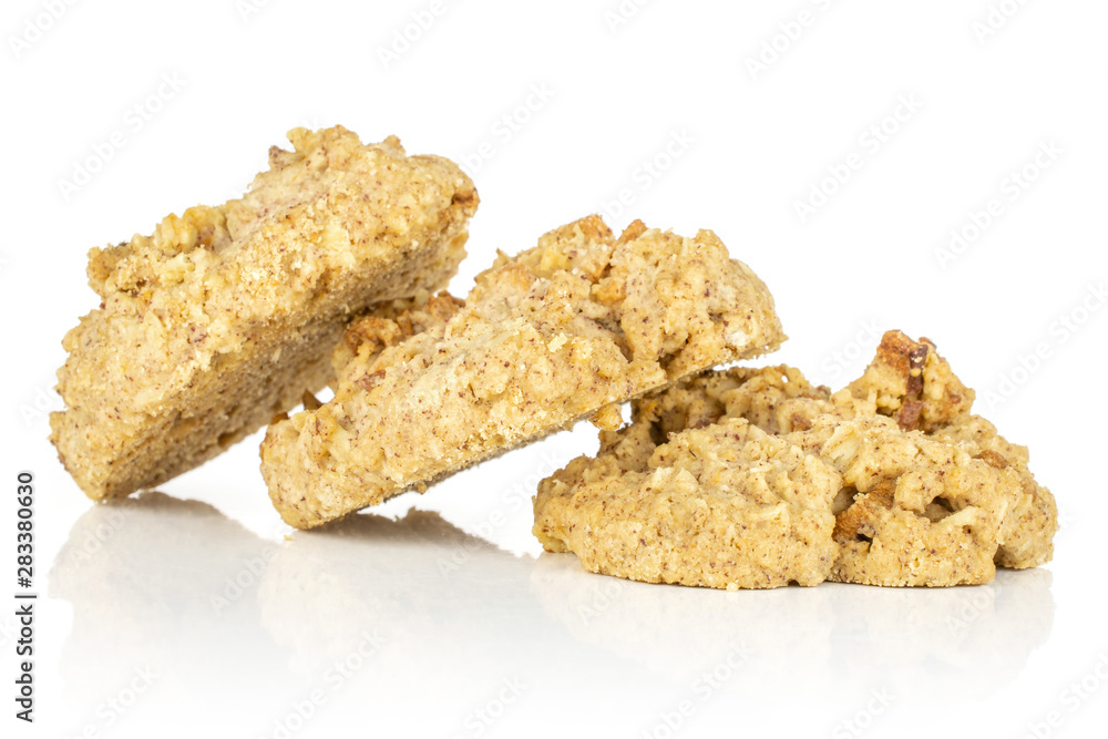 Group of three whole oat crumble biscuit in row isolated on white background