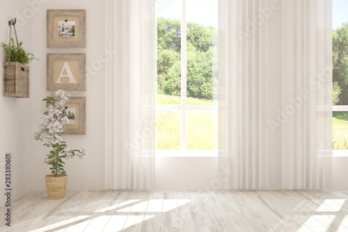 Fototapeta Naklejka Na Ścianę i Meble -  Stylish empty room in white color with summer landscape in window. Scandinavian interior design. 3D illustration