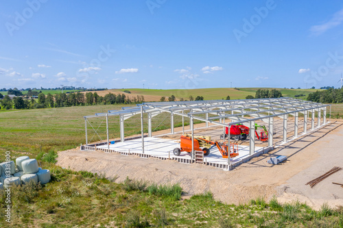 The basic structure of a new hall is erected in an industrial estate