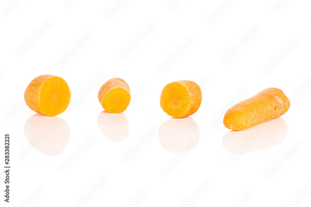 Group of one whole three halves of stale orange stale baby carrot baby isolated on white background Group of one whole three halves of stale orange stale baby carrot baby isolated on white background