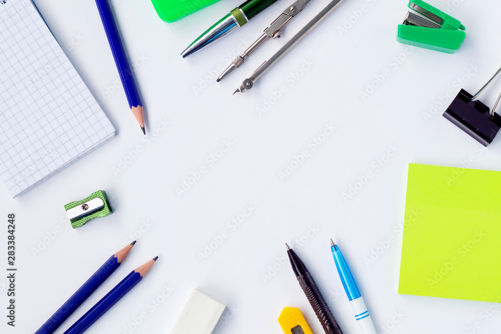 set of school supplies on white background top view. back to school set of school supplies on white background top view. back to school
