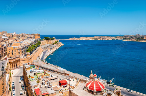 Grand Harbor of Malta with ancient walls of Valletta.