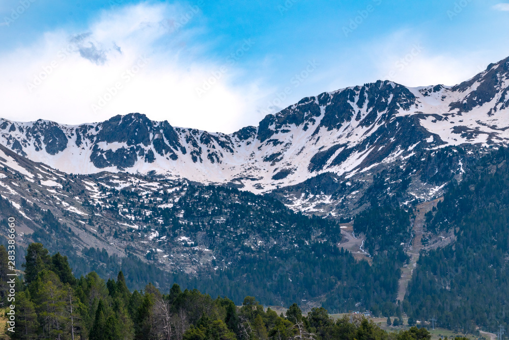 Landscape view of mountains covered in snow in Andorra.