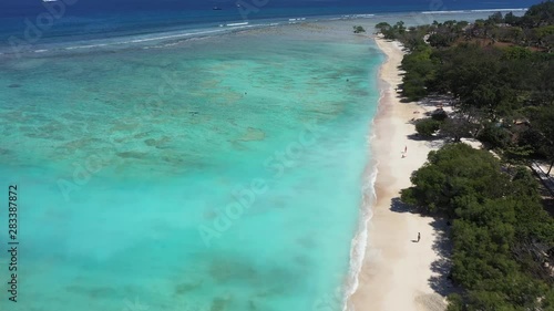 Flying over the turquoise ocean of Indonesia
