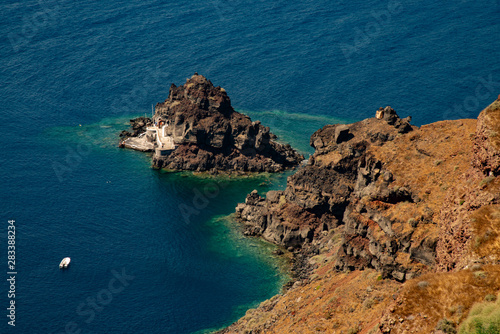 Gulf of caldera seen from Firostefani, on Santorini island in Greece. Panorama on the scoliera with crystal clear water in the Aegean Sea.