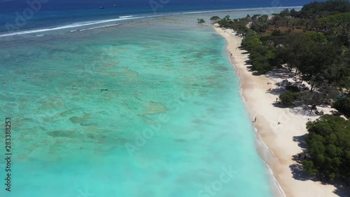Flying over the turquoise ocean of Indonesia