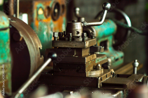 old green lathe in the workshop