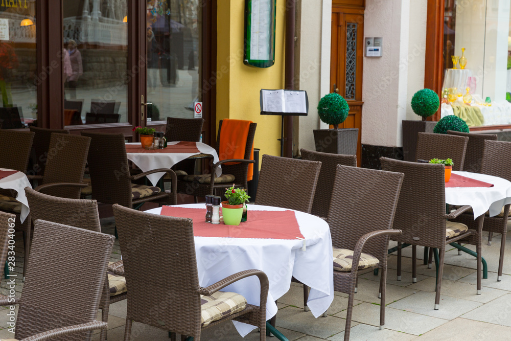 Outdoor cafe on cobblestone street, Karlovy Vary