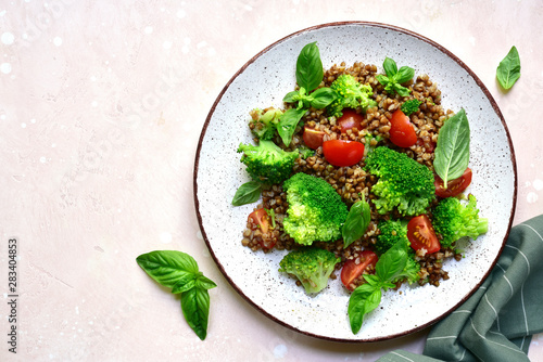 Buckwheat salad with vegetables.Top view with copy space. photo