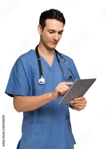 Doctor using his tablet