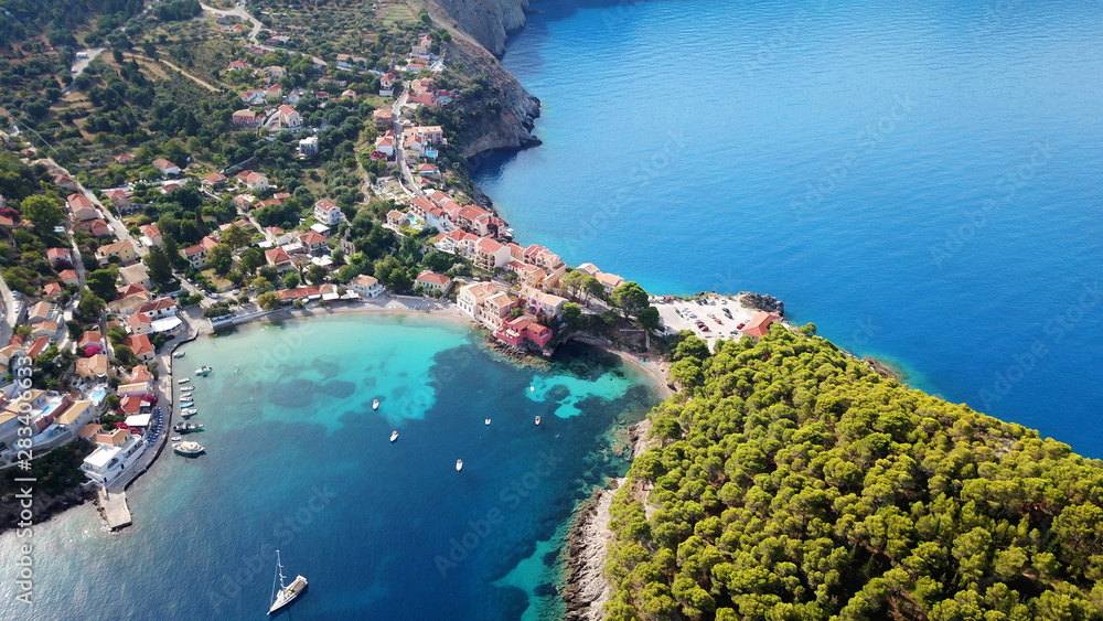 Fototapeta premium Aerial drone bird's eye view photo of beautiful and picturesque colorful traditional fishing village of Assos in island of Cefalonia, Ionian, Greece