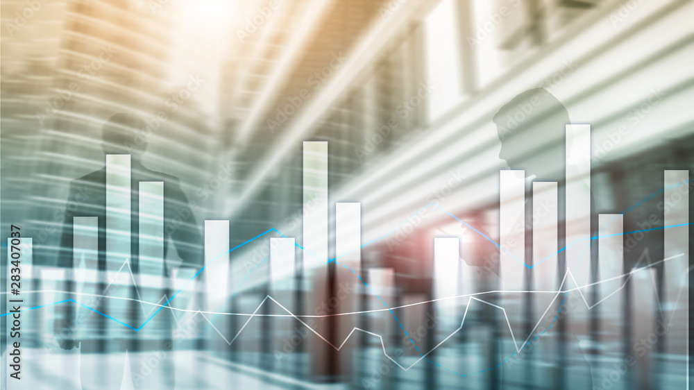 Financial graphs and charts on blurred business center background. Invesment and trading concept. Financial graphs and charts on blurred business center background. Invesment and trading concept.