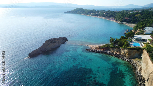 Aerial drone photo of iconic white rock cliffs and volcanic formations near famous beach of Platys and Makrys gialos with turquoise clear sea, Argostoli, Cefalonia island, Ionian, Greece photo