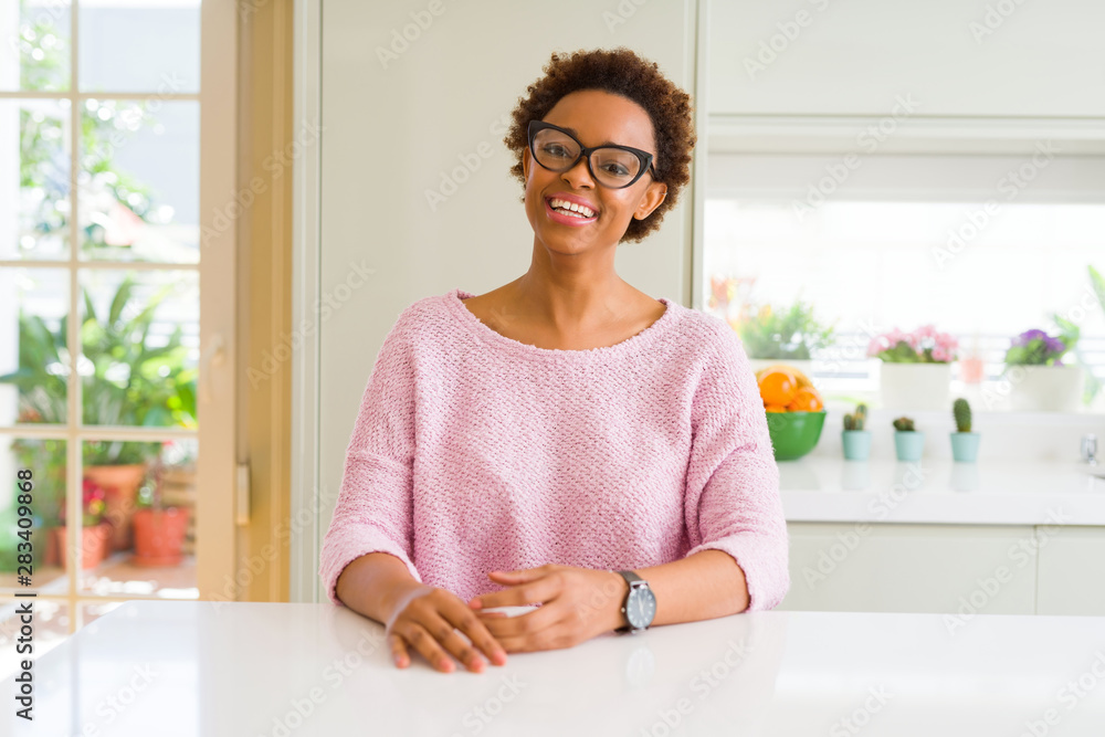 Beautiful young african woman with afro hair wearing glasses Beautiful young african woman with afro hair wearing glasses