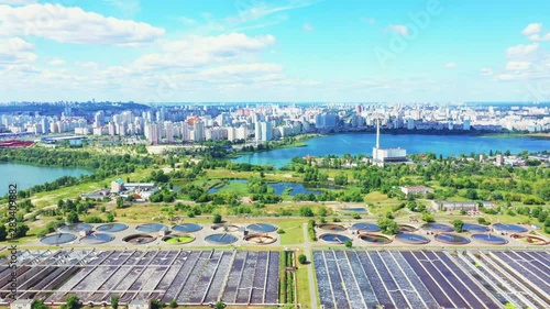 Wastewater Treatment Plant including grit chamber, basins, clarifiers, aeration - drone look-down aerial crab shot photo