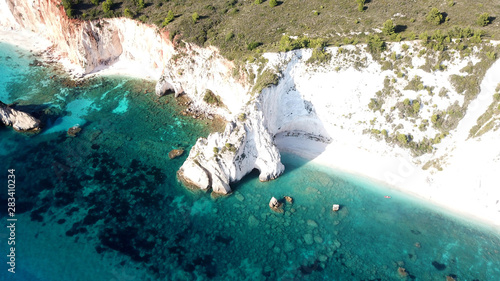 Aerial drone photo of iconic white rock cliffs and volcanic formations near famous beach of Platys and Makrys gialos with turquoise clear sea, Argostoli, Cefalonia island, Ionian, Greece photo