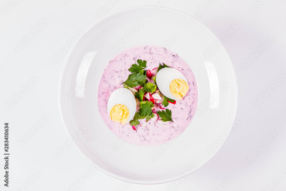 Cold borscht (chlodnik) - traditional Lithuanian cold soup with radish, parsley, dill and egg Cold borscht (chlodnik) - traditional Lithuanian cold soup with radish, parsley, dill and egg