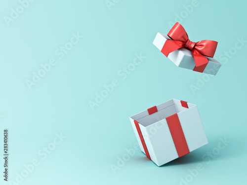 Open gift box or present box with red ribbon and bow isolated on green blue pastel color background with shadow 3D rendering photo