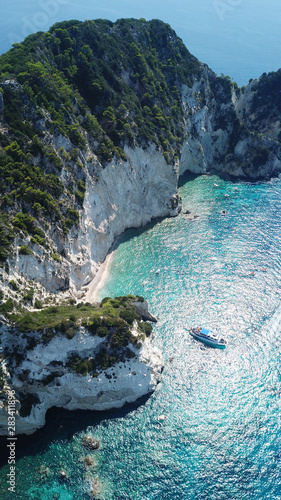 Fototapeta Naklejka Na Ścianę i Meble -  Aerial drone photo of famous white caves in small island of Marathonisi and beautiful turquoise seascape, Zakynthos island, Ionian, Greece