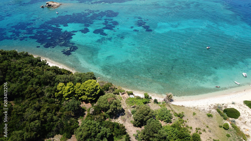 Aerial drone view of iconic small island of Marathonisi featuring clear turquoise water sandy shore and natural hatchery of Caretta-Caretta sea turtles, Zakynthos island, Ionian, Greece