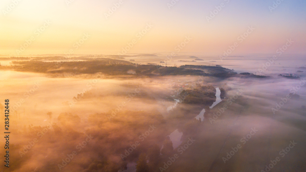 Summer landscape aerial panorama. Morning fog over river