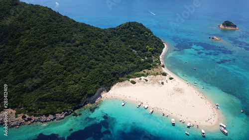 Aerial drone photo of tropical Caribbean bay with white sand beach and beautiful turquoise and sapphire clear sea