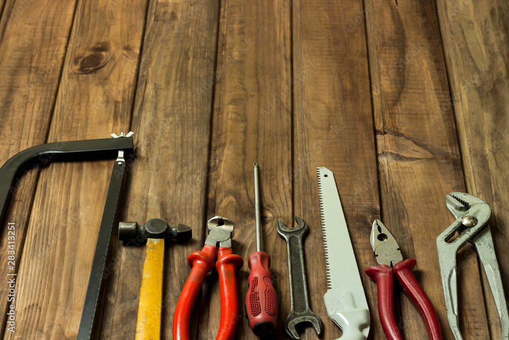 tools in the workshop on the table, empty space for advertisement or text tools in the workshop on the table, empty space for advertisement or text