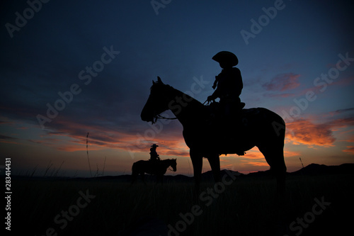Cowgirls at Sunset
