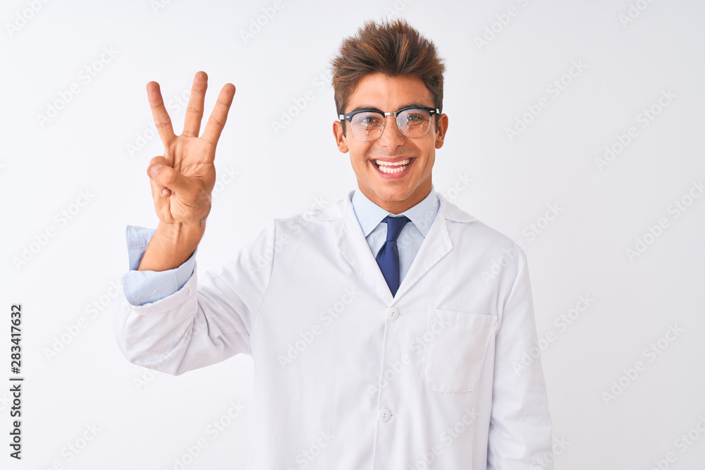 Young handsome sciencist man wearing glasses and coat over isolated white background showing and pointing up with fingers number three while smiling confident and happy. Young handsome sciencist man wearing glasses and coat over isolated white background showing and pointing up with fingers number three while smiling confident and happy.