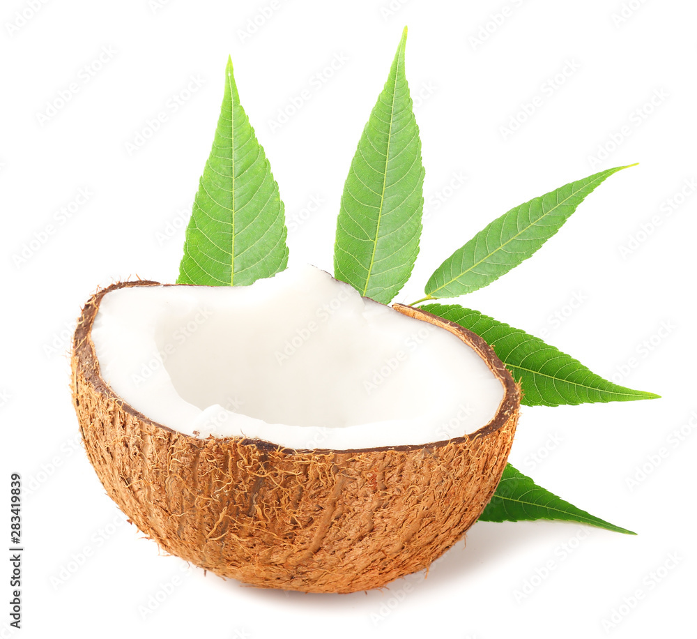 half of coconut with green leaves isolated on white background half of coconut with green leaves isolated on white background
