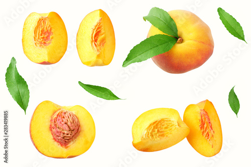 Fototapeta Naklejka Na Ścianę i Meble -  peach fruit with green leaf and slices isolated on white background. top view
