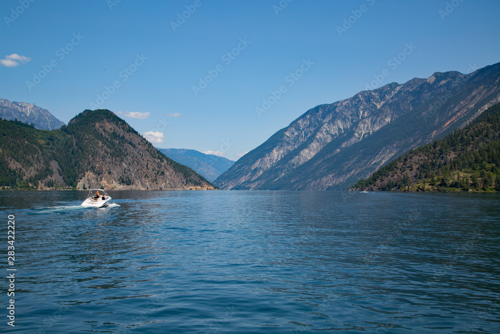 Anderson Lake BC with boat speeding away