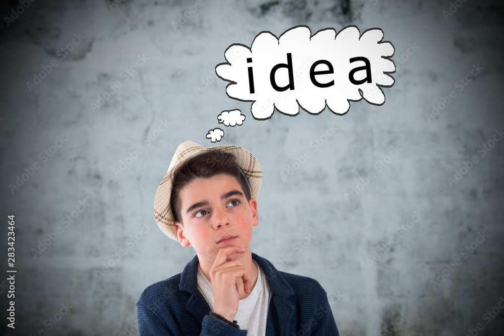 portrait of thoughtful boy with idea concept portrait of thoughtful boy with idea concept