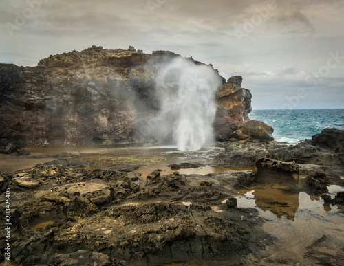 Sea water spouting from the Nakalele Blowhole on the northeast coast of Maui, Hawaii.
