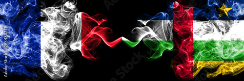 France vs Central African Republic smoky mystic flags placed side by side. Thick colored silky abstract smoke banner of French and Central African Republic photo