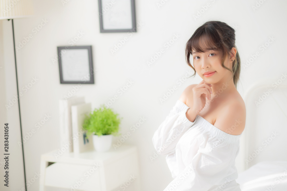 Portrait of beautiful young asian woman makeup of cosmetic, girl happy and smile attractive, face of beauty perfect with wellness in the bedroom at home with skin care and healthcare concept. Portrait of beautiful young asian woman makeup of cosmetic, girl happy and smile attractive, face of beauty perfect with wellness in the bedroom at home with skin care and healthcare concept.