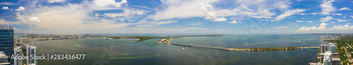 Beautiful aerial panorama of Brickell Bay. Scene includes water bridges and harbor overlooking Key Biscayne