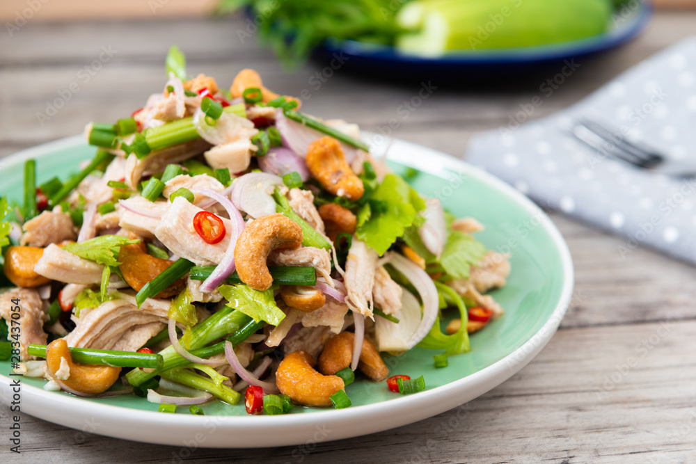 Steamed rip chicken spicy salad with shallot, celery, chili and Scallion.