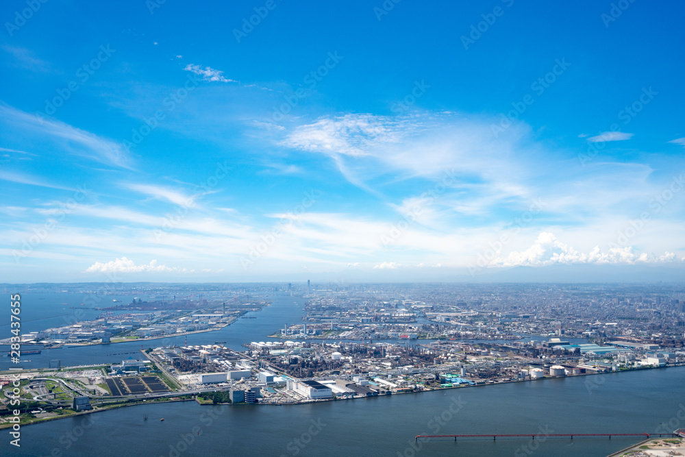 Panoramic view of Industrial zone in background with blue sky during summer, Tokyo, Japan