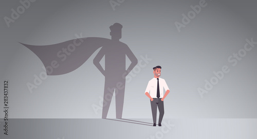 businessman dreaming about being super hero shadow of man with cape imagination aspiration concept male cartoon character standing pose full length flat horizontal
