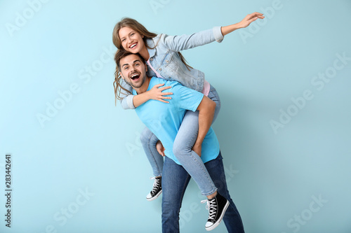 Happy young couple having f...