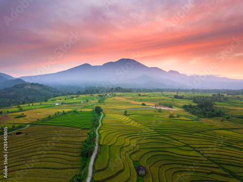 high mountain photos from the air where the red sky and sunrise are very beautiful and spoil the eyes above the rice fields in bengkulu, indonesia, asia